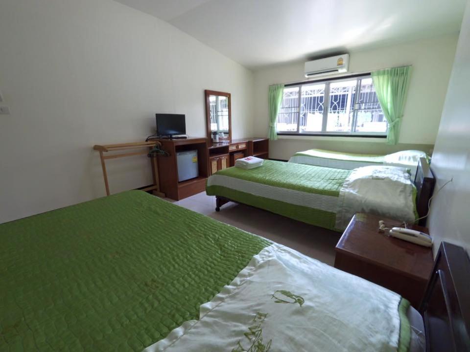 Postel nebo postele na pokoji v ubytování Topnorth Hotel Maesai