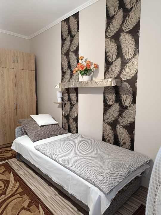 Posteľ alebo postele v izbe v ubytovaní Melinda Apartman