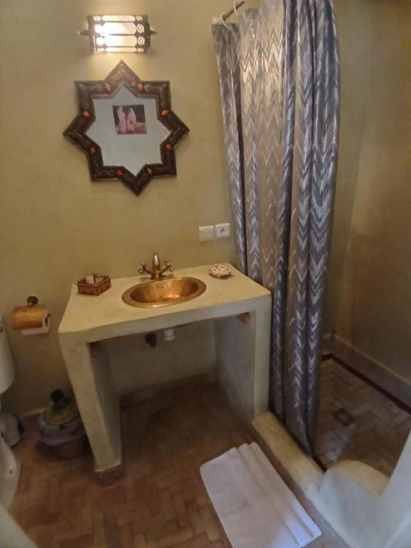 Koupelna v ubytování Riad Dantella