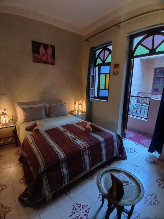 Postel nebo postele na pokoji v ubytování Riad Dantella