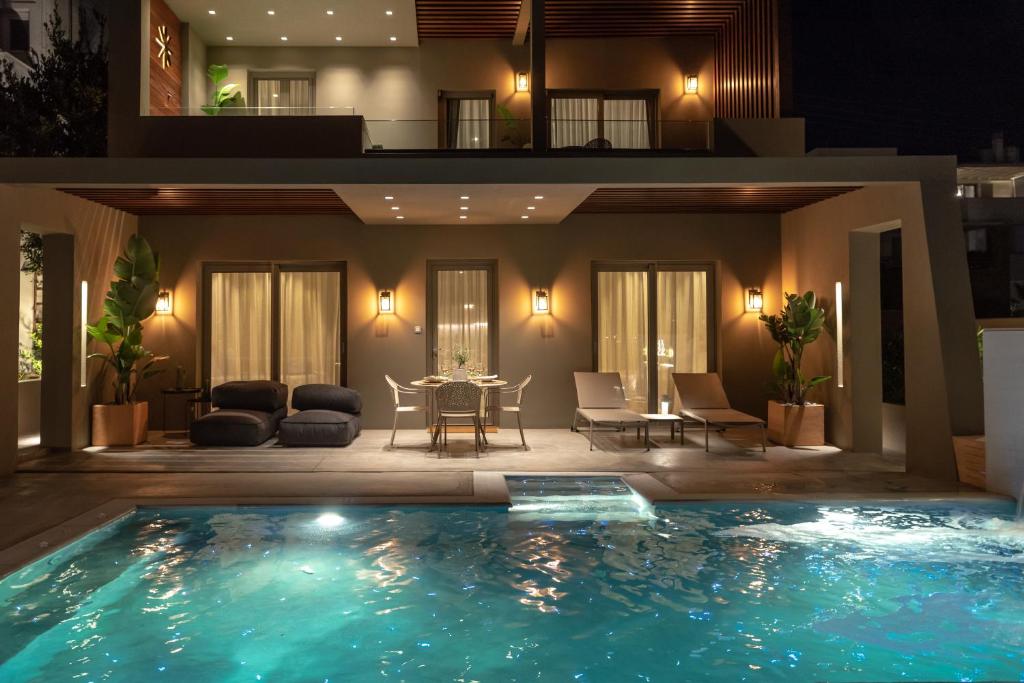 Bazén v ubytování Coocono Tinos Private Boutique Villas nebo v jeho okolí