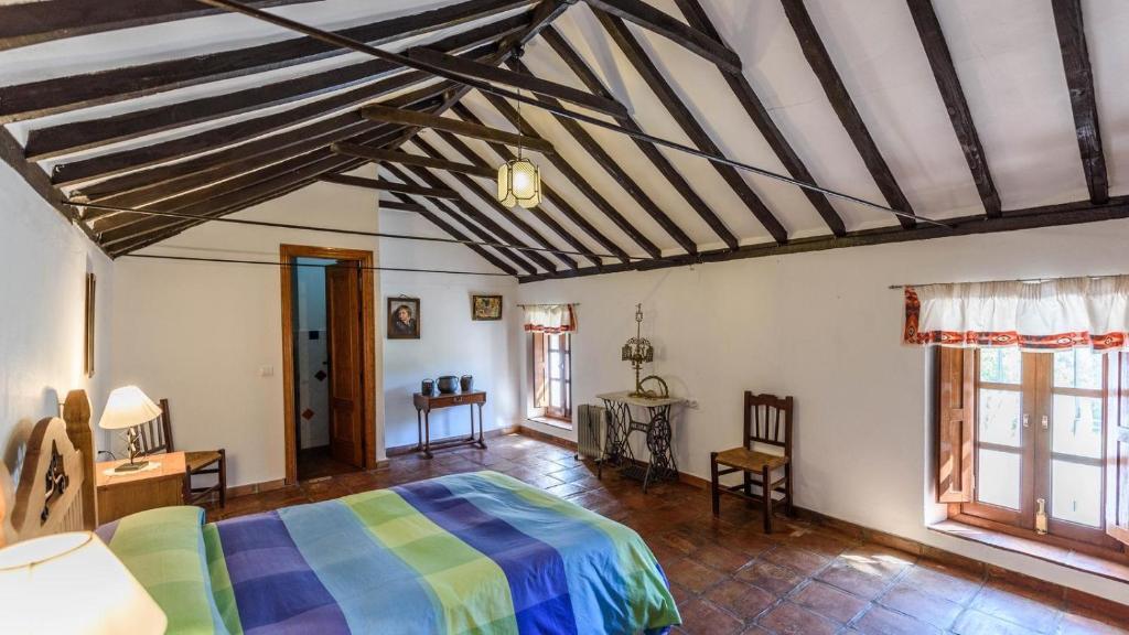 Postel nebo postele na pokoji v ubytování Casa del Tigre Gaucín by Ruralidays