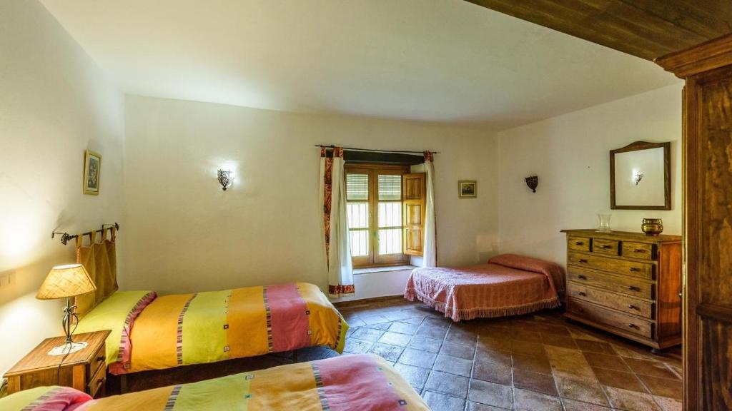 Postel nebo postele na pokoji v ubytování Casa del Tigre Gaucín by Ruralidays