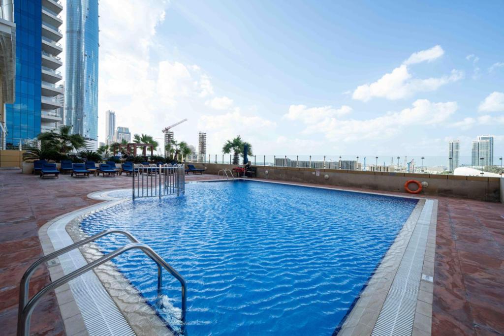 Image showcasing Upgraded Stylish Living with Private Steam Room, Dubai (updated prices ...