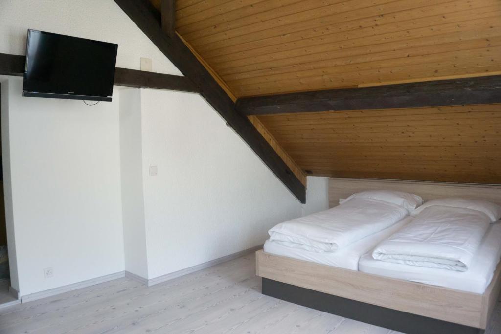 Postel nebo postele na pokoji v ubytování Speiserestaurant Traube