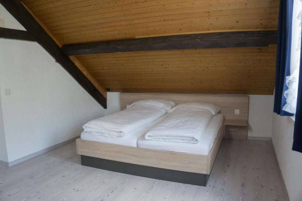 Postel nebo postele na pokoji v ubytování Speiserestaurant Traube