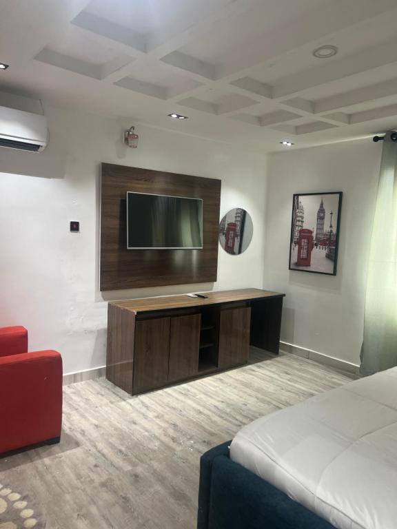 Postel nebo postele na pokoji v ubytování Florence Hotel and suites