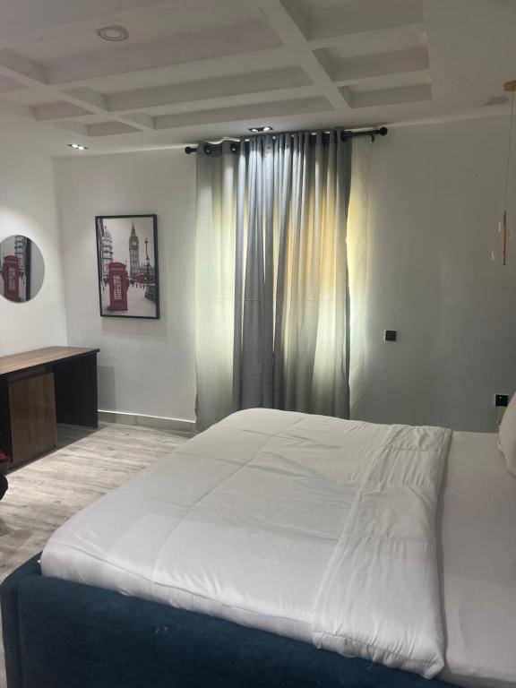 Postel nebo postele na pokoji v ubytování Florence Hotel and suites