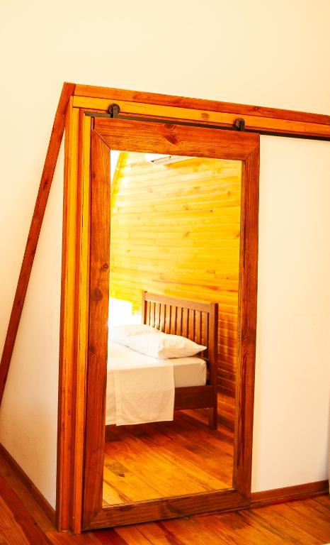 Postel nebo postele na pokoji v ubytování Pousada Morada das Araucarias