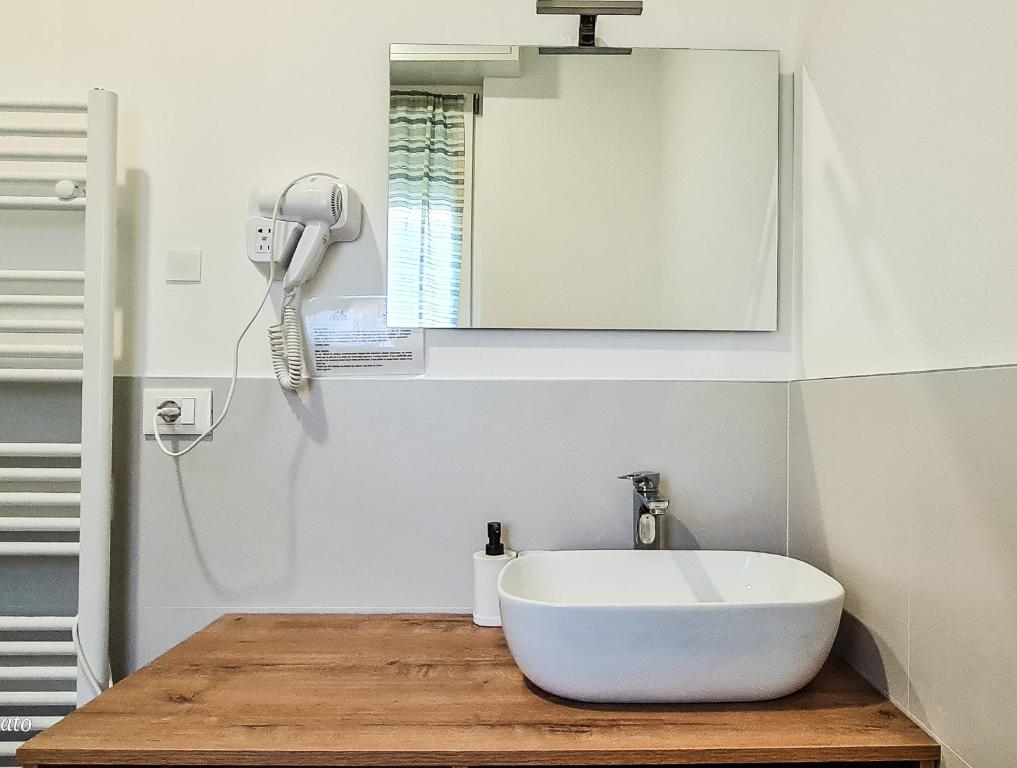 Koupelna v ubytování Adriroomsrho