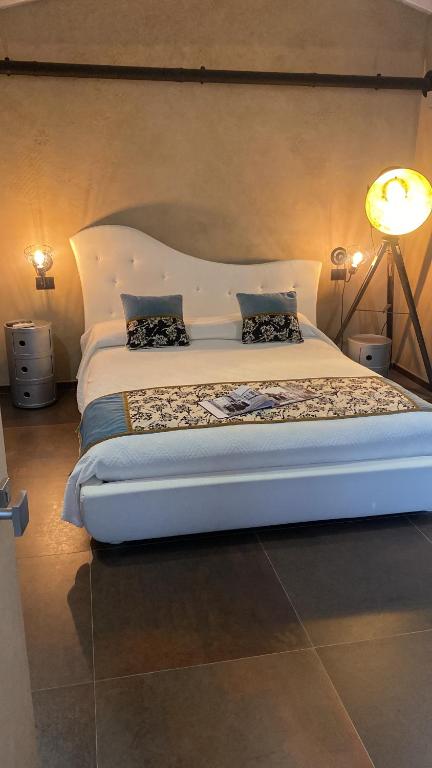 Postel nebo postele na pokoji v ubytování LUVIA ROOMS SPA