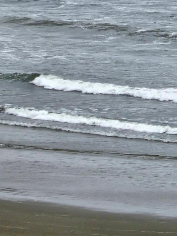 a view of the ocean from the beach at Itararé um sonho de mar in São Vicente