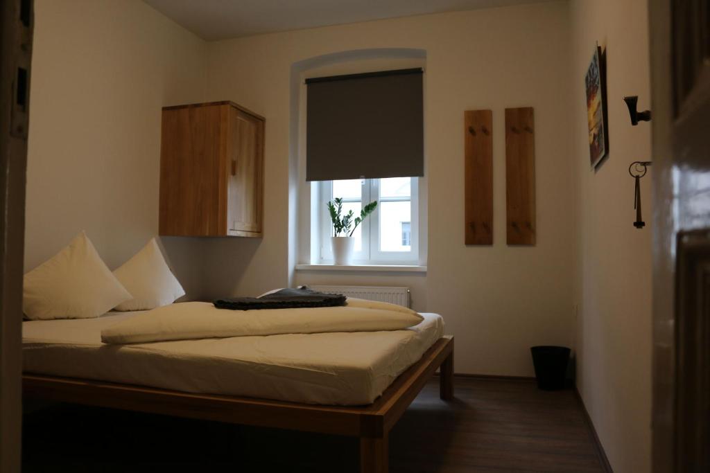Una cama o camas en una habitación de Hotel SINOS