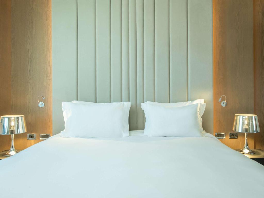Postel nebo postele na pokoji v ubytování Sofitel Athens Airport