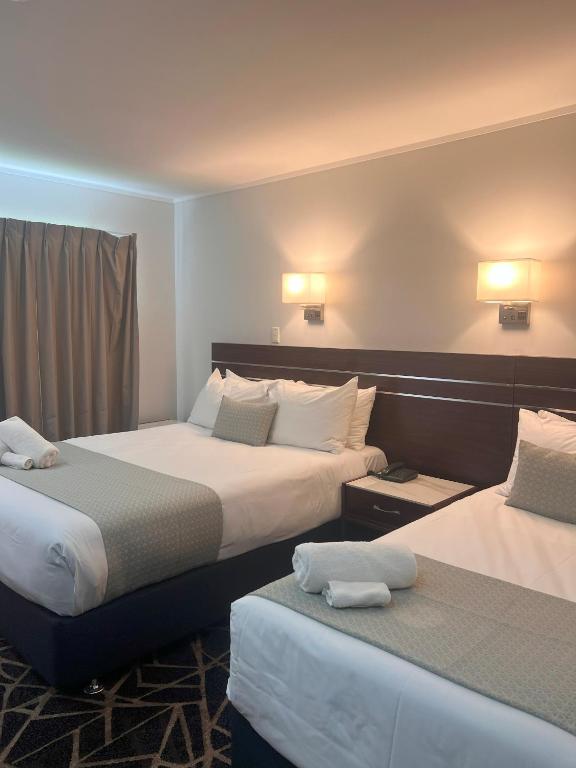 Krevet ili kreveti u jedinici u objektu Auckland Airport Kiwi Hotel