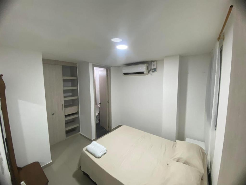 Postel nebo postele na pokoji v ubytování HOTEL IBIZA