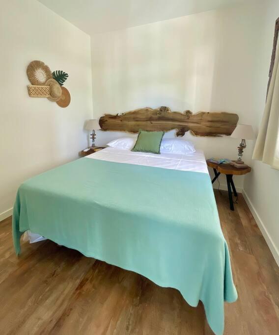 Postel nebo postele na pokoji v ubytování Te Miti - Tropical paradise retreat