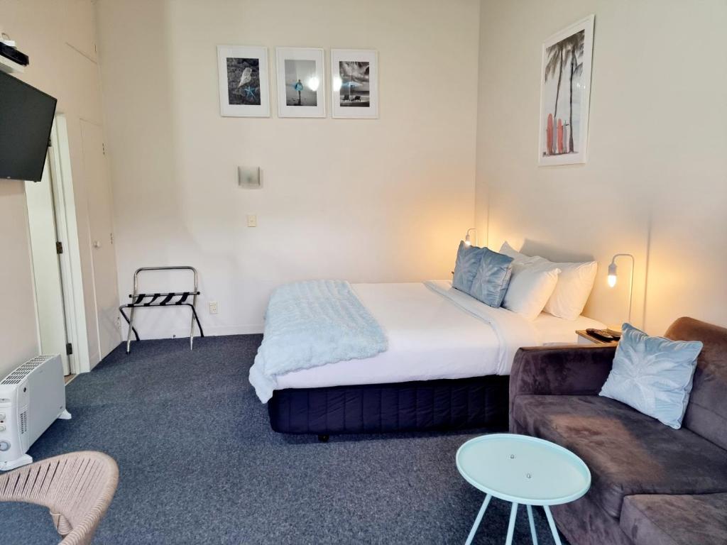Postel nebo postele na pokoji v ubytování Southpacific Motel