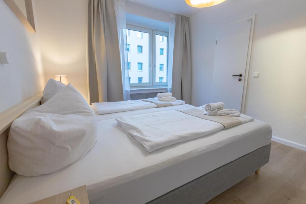 Postel nebo postele na pokoji v ubytování Hotel Doerenkamp - Digital Access
