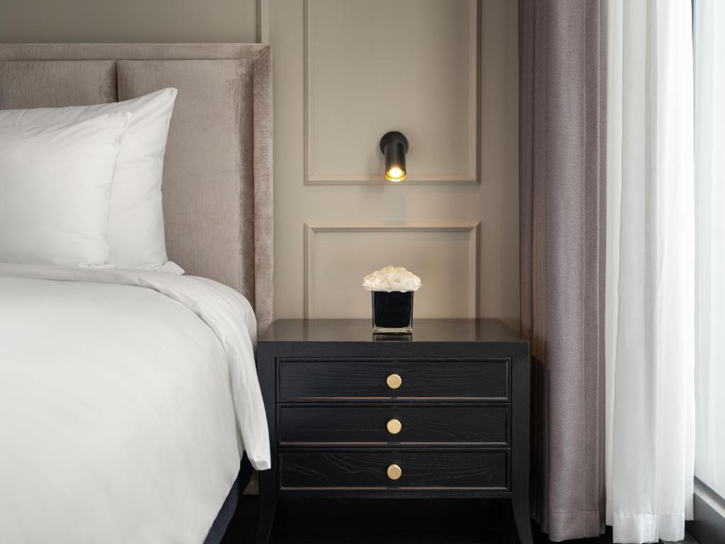 Postel nebo postele na pokoji v ubytování T Boutique Hotel