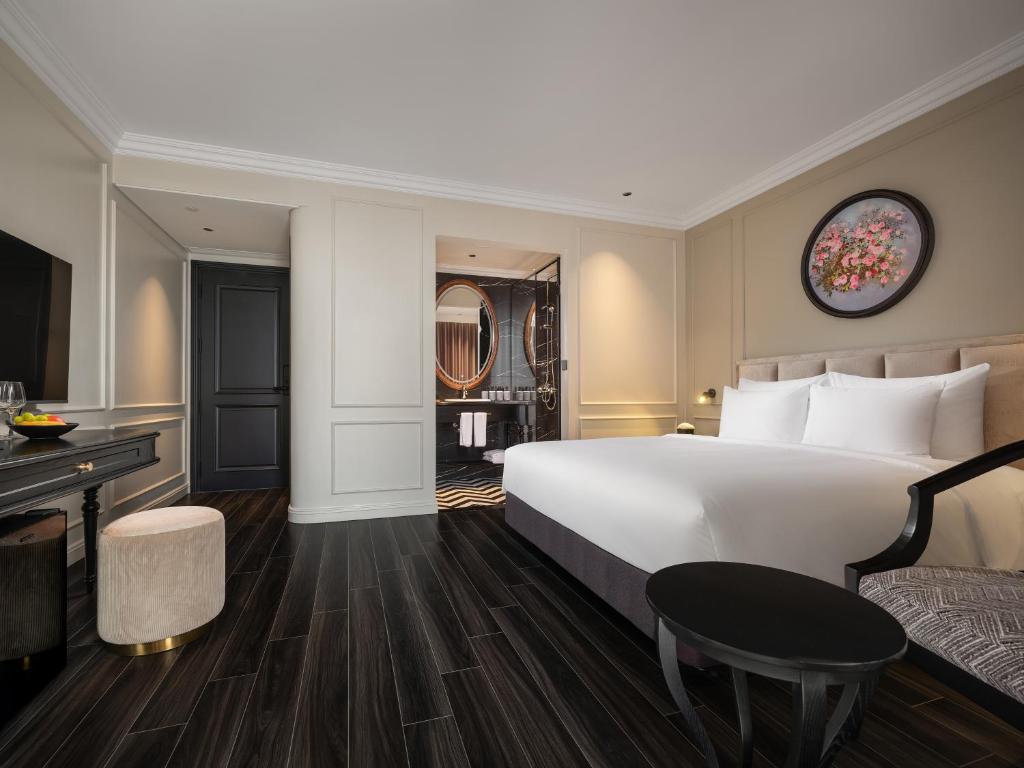 Postel nebo postele na pokoji v ubytování T Boutique Hotel