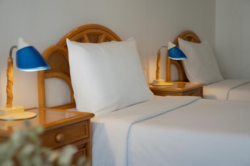 Giường trong phòng chung tại Green Nha Trang