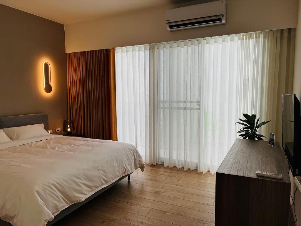 Voodi või voodid majutusasutuse Yama no Shita Homestay toas