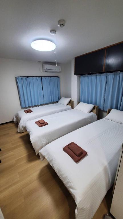 Postel nebo postele na pokoji v ubytování Uhome Tabata Apartment