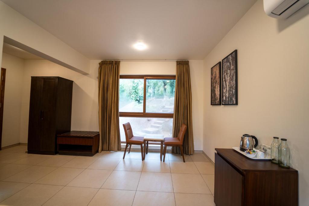 Kuchyň nebo kuchyňský kout v ubytování The Birchwood Retreat, Madikeri