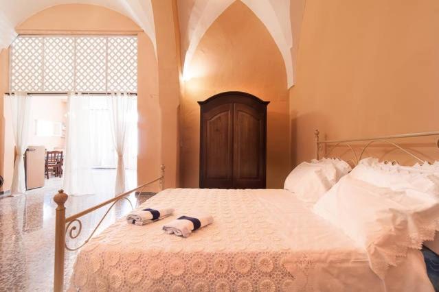Een bed of bedden in een kamer bij La Marchesa di Castiglione
