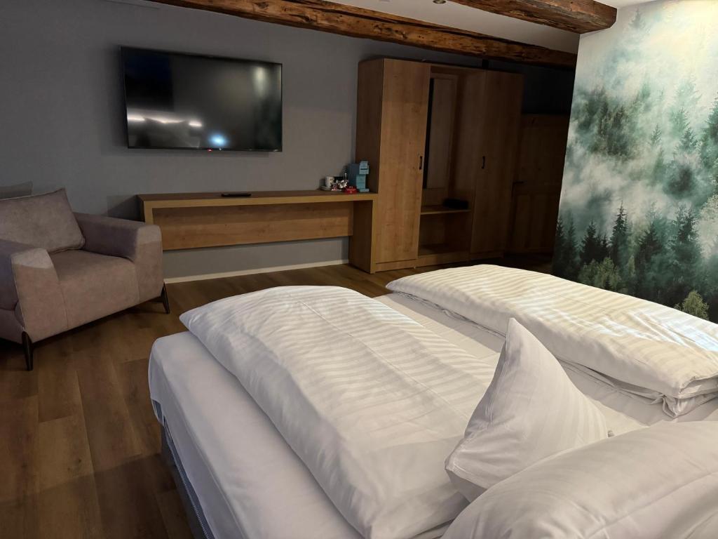 Postel nebo postele na pokoji v ubytování Goldener Stern