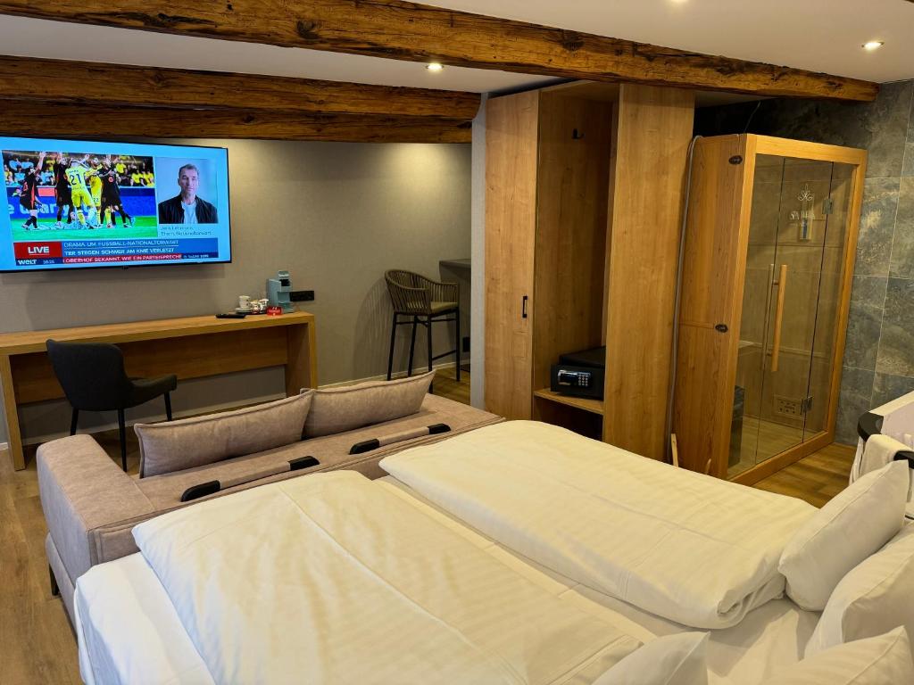 TV a/nebo společenská místnost v ubytování Goldener Stern