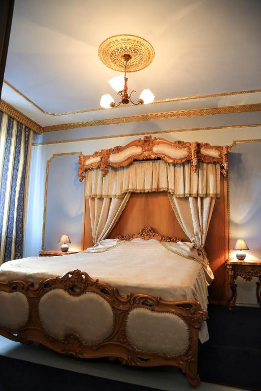 Postel nebo postele na pokoji v ubytování Hotel Kreta