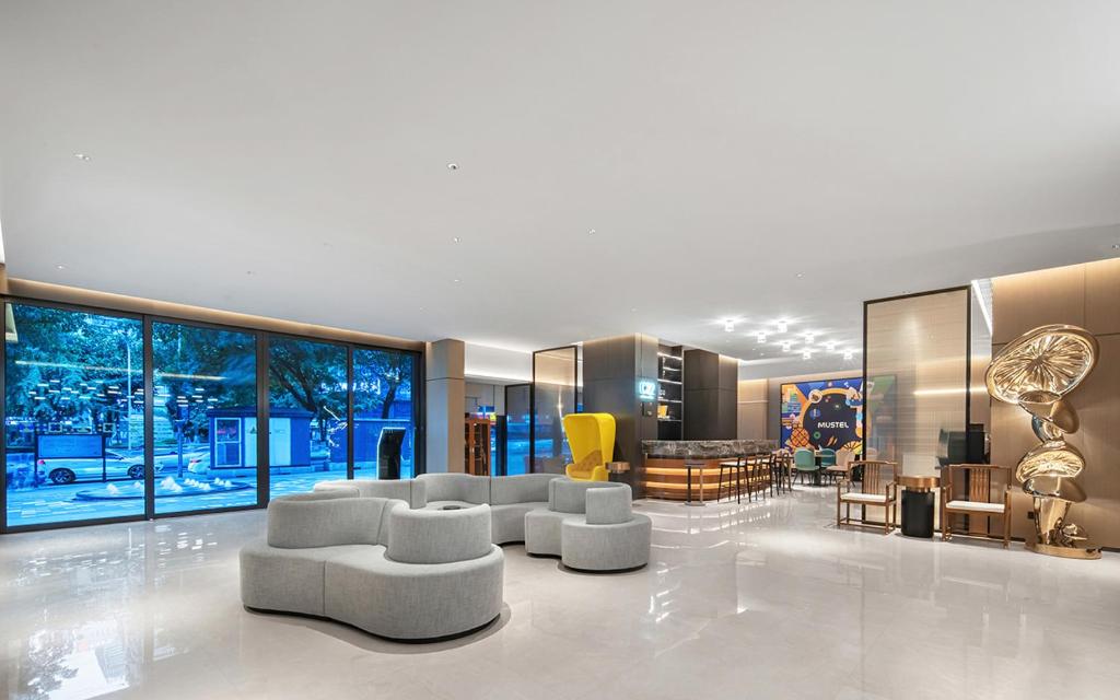 Posezení v ubytování The Mustel Hotel Chongqing Hongyadong