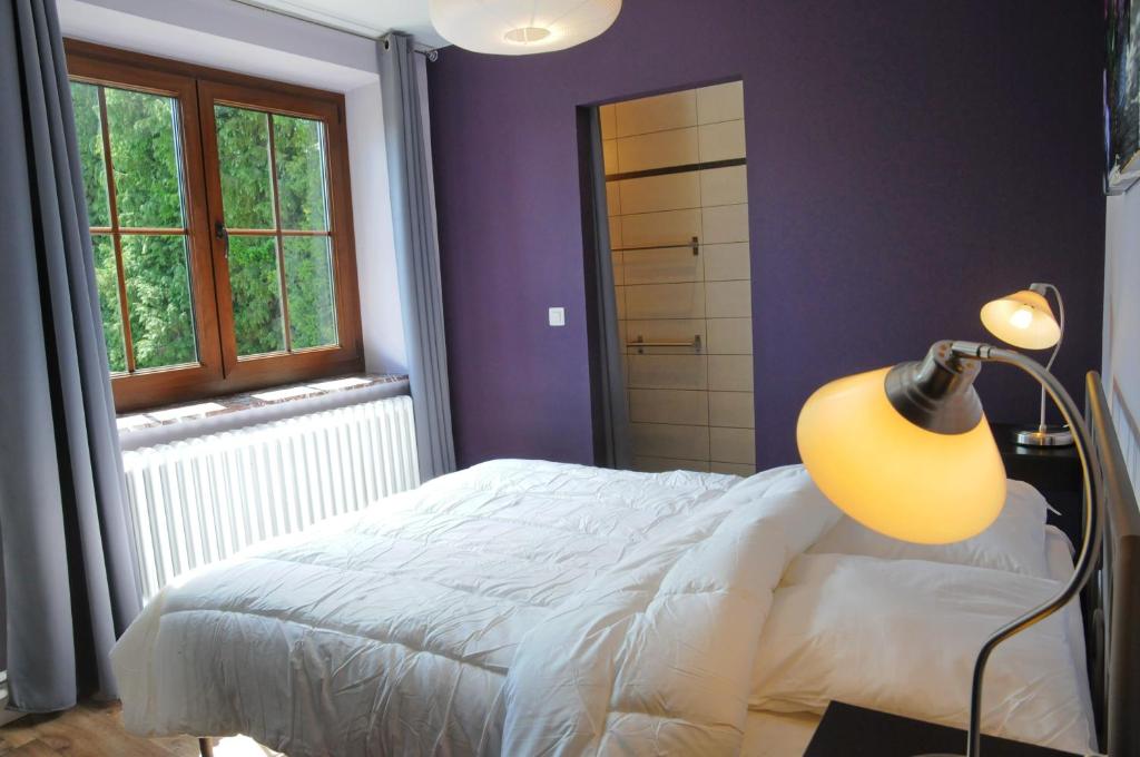 Postel nebo postele na pokoji v ubytování Gîte Miss Chloé