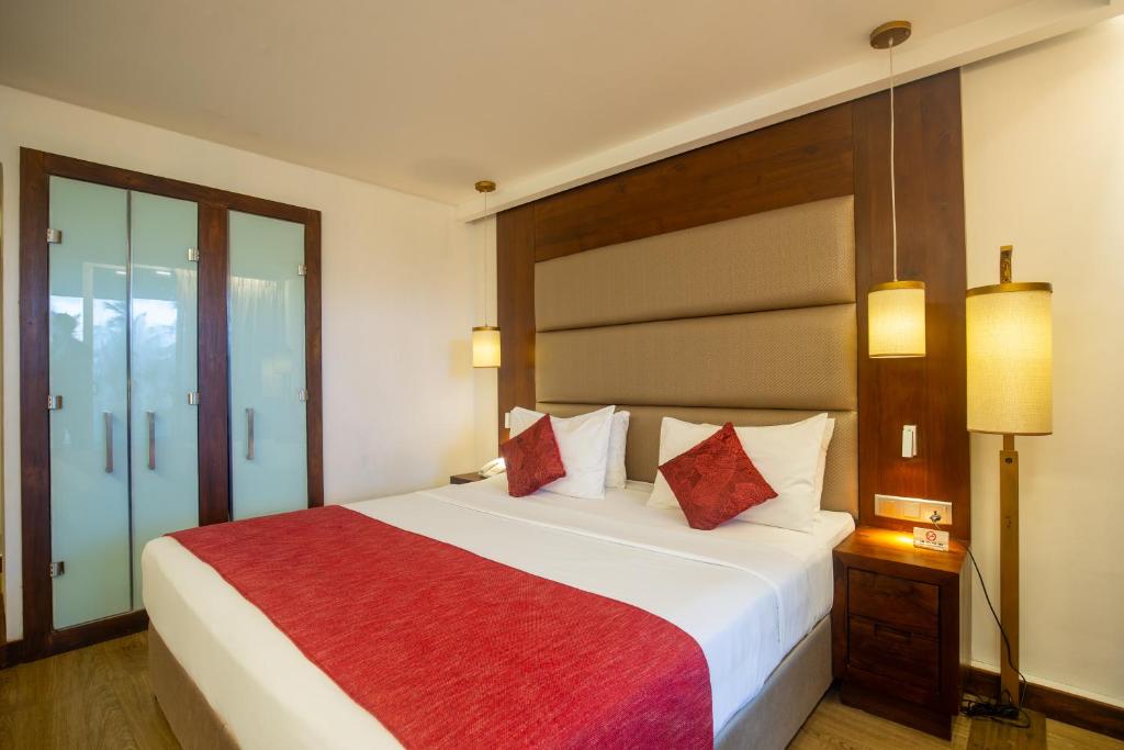 Postel nebo postele na pokoji v ubytování Pegasus Reef - A Beach Resort in Colombo