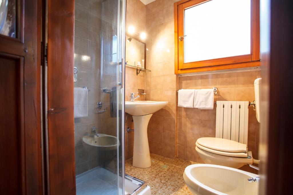 Koupelna v ubytování Hotel Olimpic