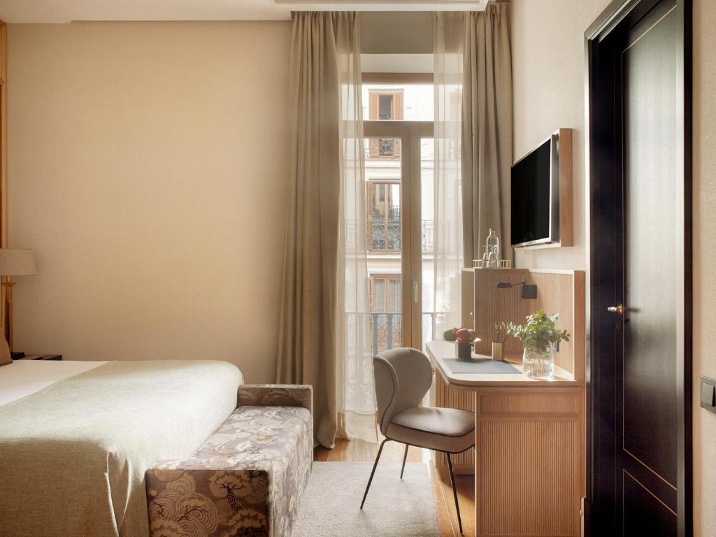 TV a/nebo společenská místnost v ubytování Hotel Único Madrid, Small Luxury Hotels