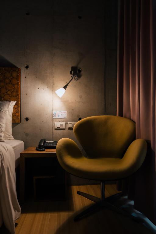A bed or beds in a room at The Light
