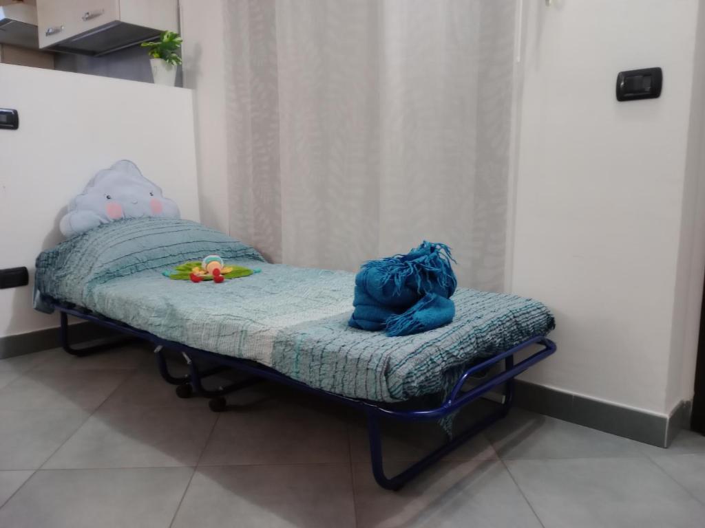 Łóżko lub łóżka w pokoju w obiekcie Il nido di Pietro
