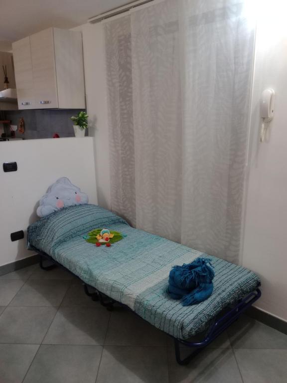 Łóżko lub łóżka w pokoju w obiekcie Il nido di Pietro