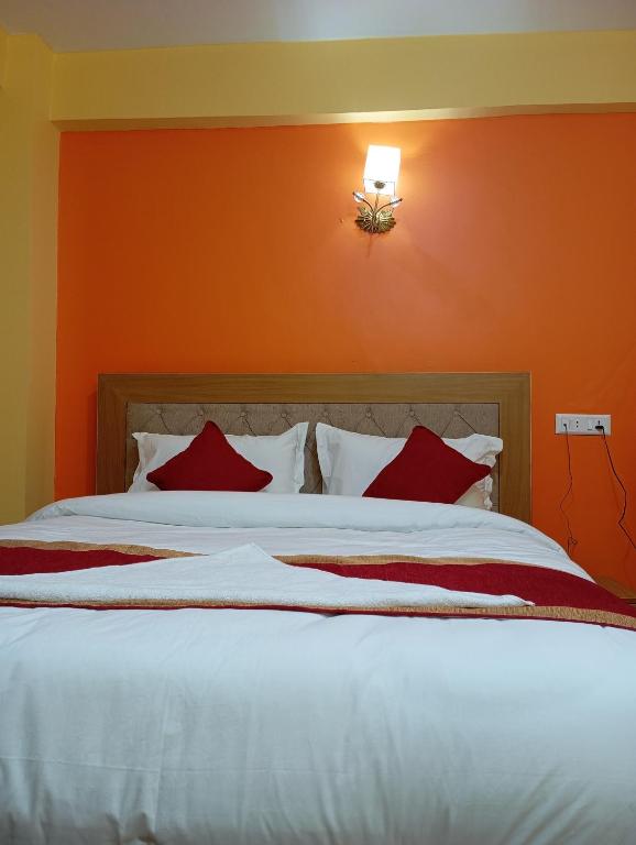 Postel nebo postele na pokoji v ubytování Rambler's Hotel