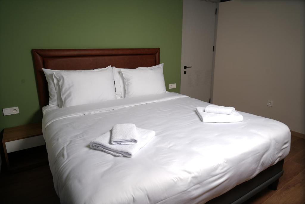 Postel nebo postele na pokoji v ubytování Eikon Apartments Abastumani