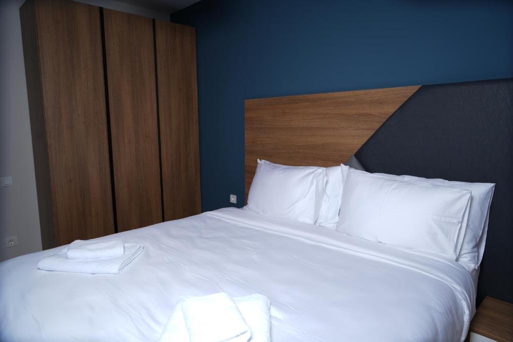 Postel nebo postele na pokoji v ubytování Eikon Apartments Abastumani