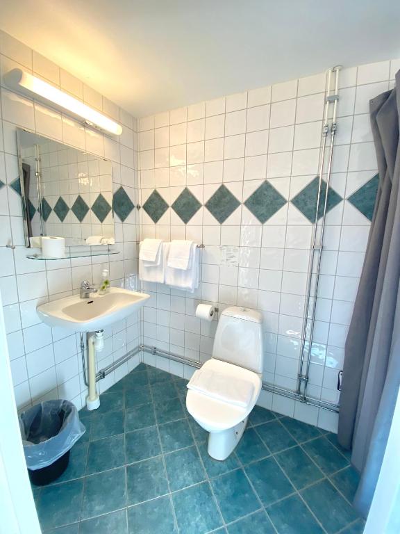Koupelna v ubytování Hotell City