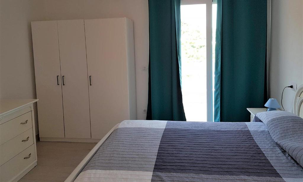 Кровать или кровати в номере Hotel Stella Maris