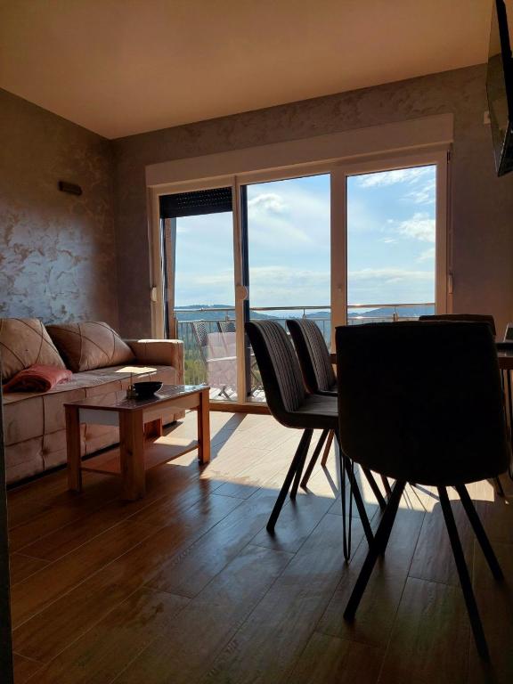Posezení v ubytování Apartman DIVČI TRON 10