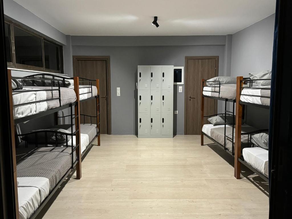 Letto o letti in una camera di BLUE LINE Coliving