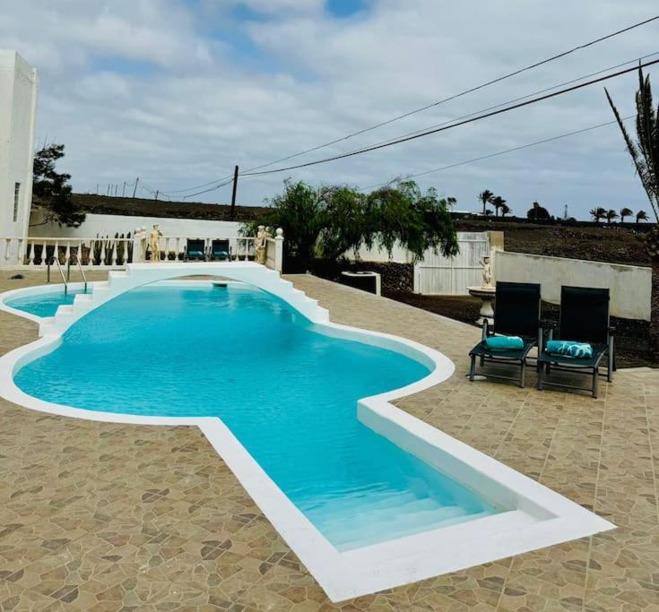 Πισίνα στο ή κοντά στο Villa PiedraNegra