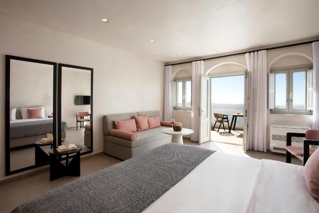 Postel nebo postele na pokoji v ubytování Andromeda Villas & Spa Resort